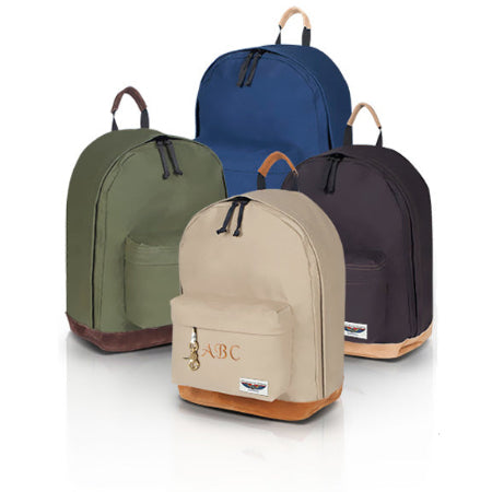 Four backpacks in different colors on a white background
