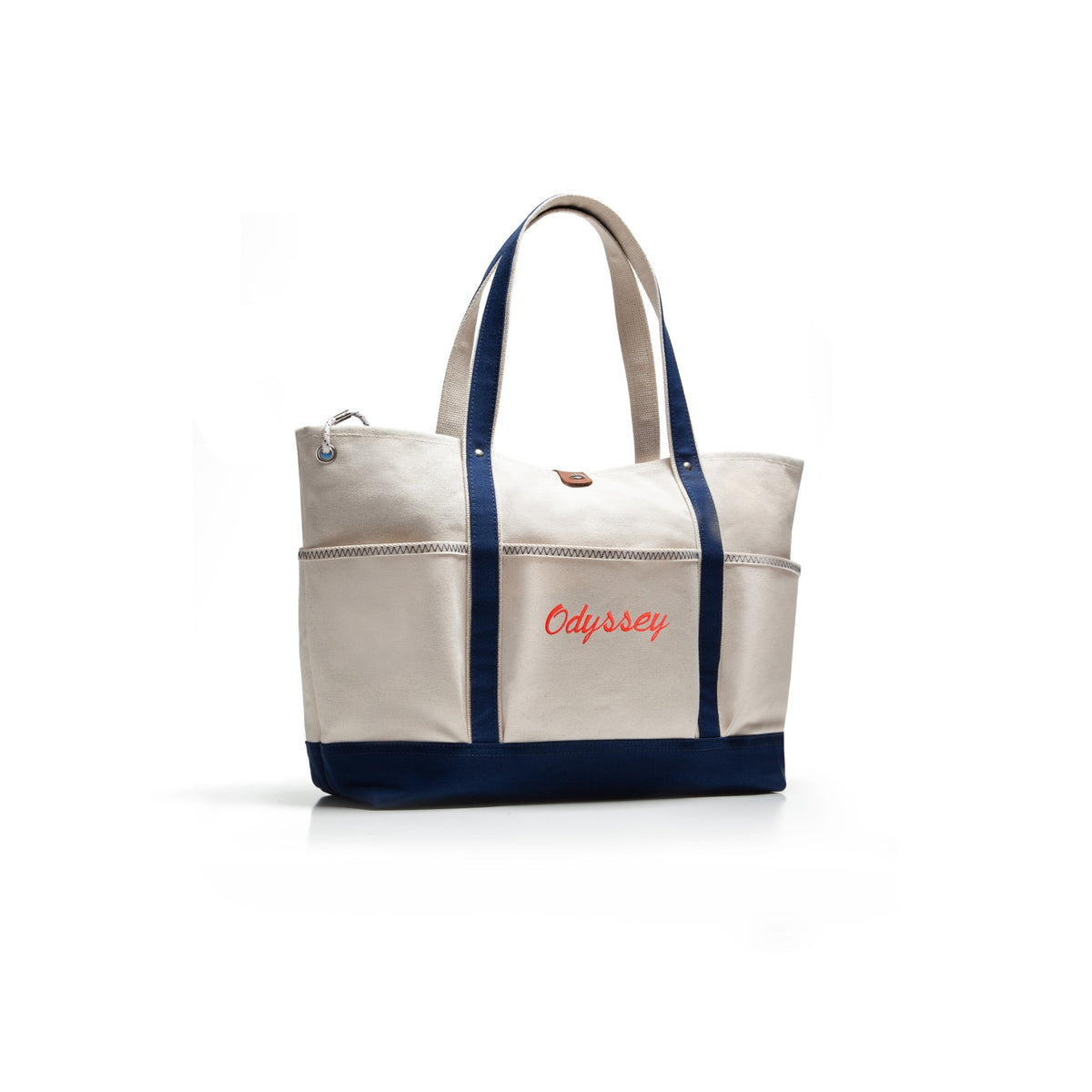 beige canvas tote bag with pockets and monogrammed Odyssey