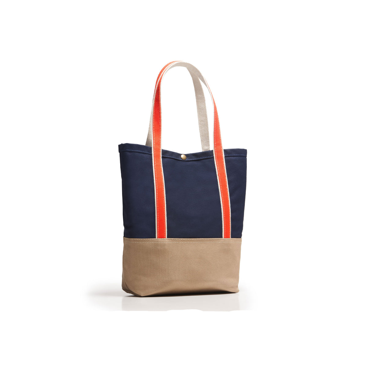 A canvas tote bag with a navy blue upper section, a beige lower base, and dual shoulder straps that are beige with bright orange-red center stripes, shown on a clean white background.