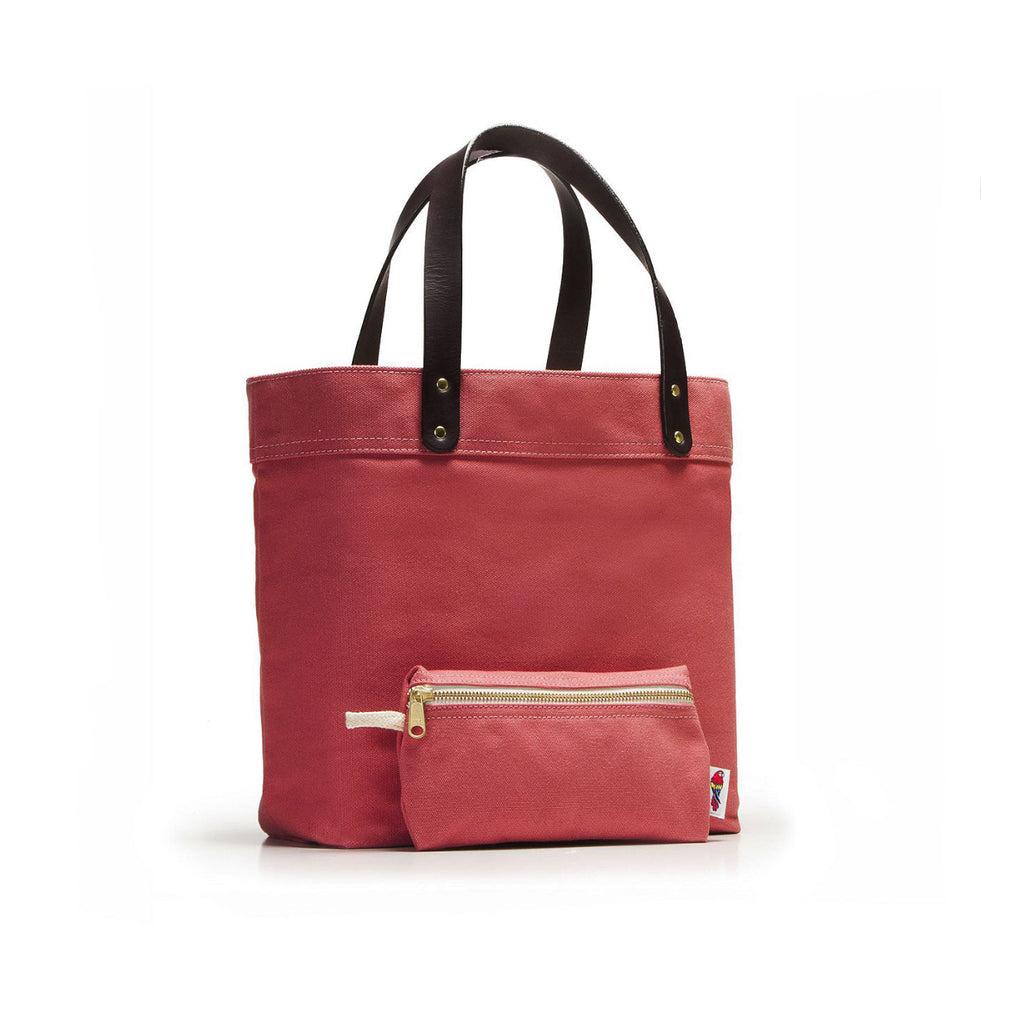 Red tote bag with brown handles on a white background