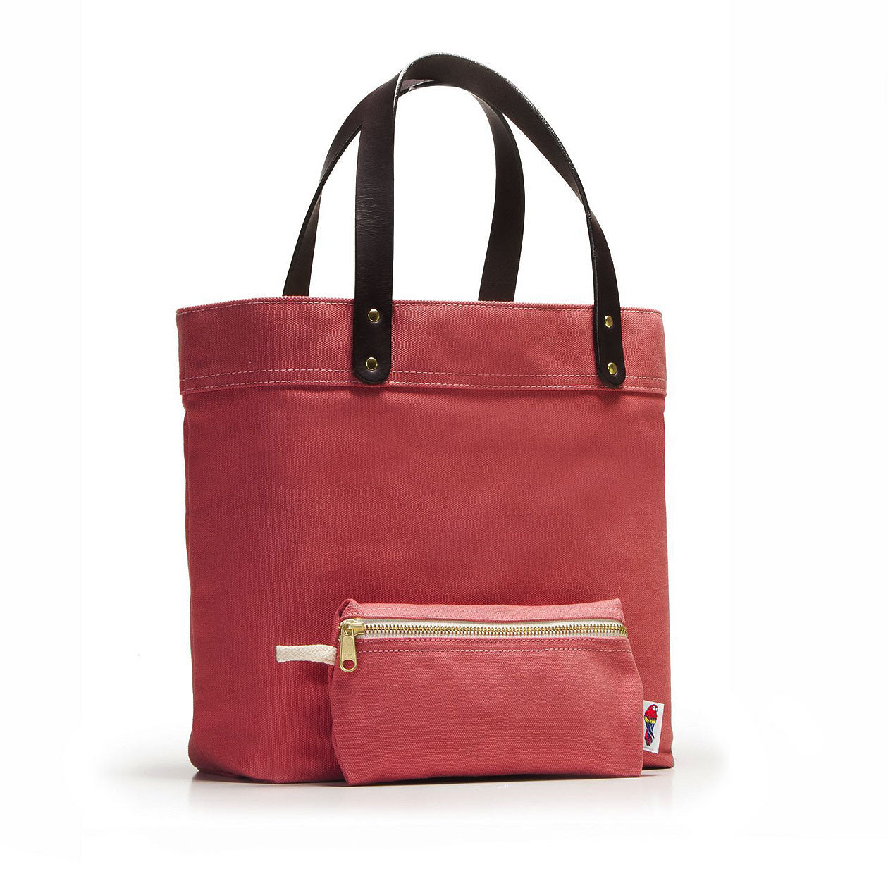 Red tote bag with black handles on a white background