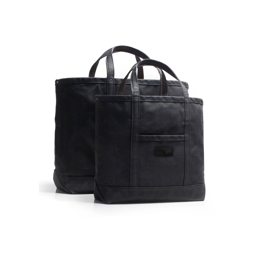 Two black tote bags on a white background