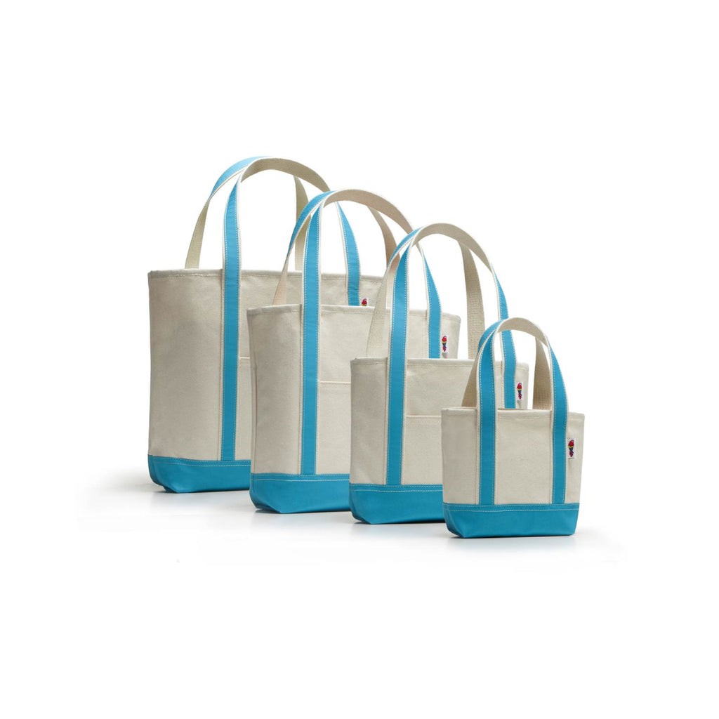 Set of four tote bags with blue accents on a white background