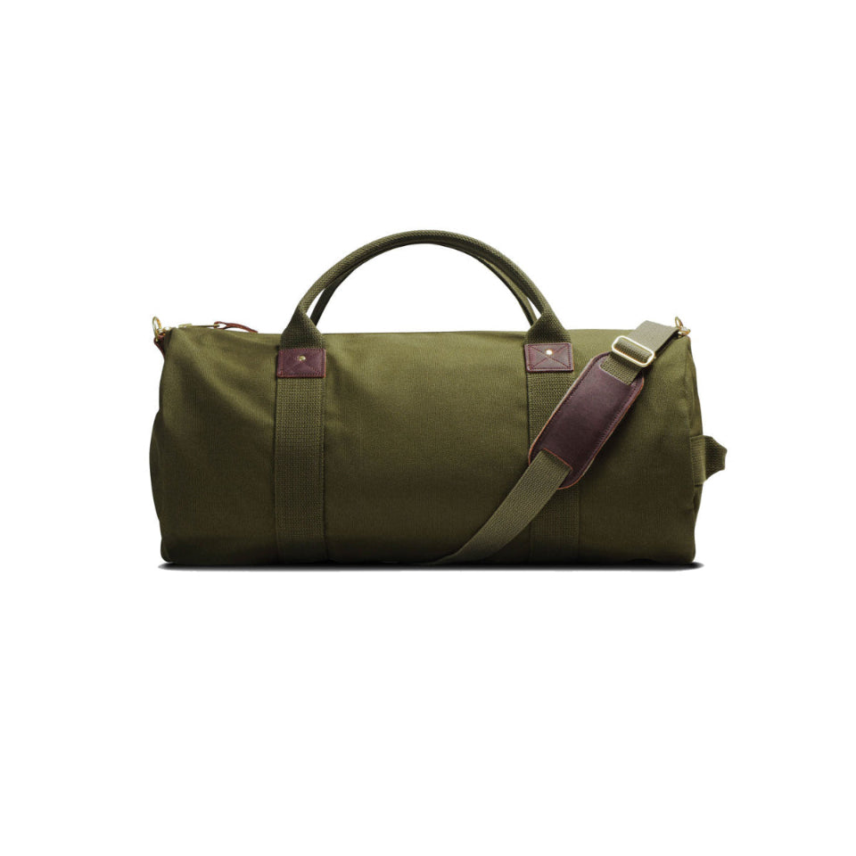 Green duffel bag with a brown strap on a white background