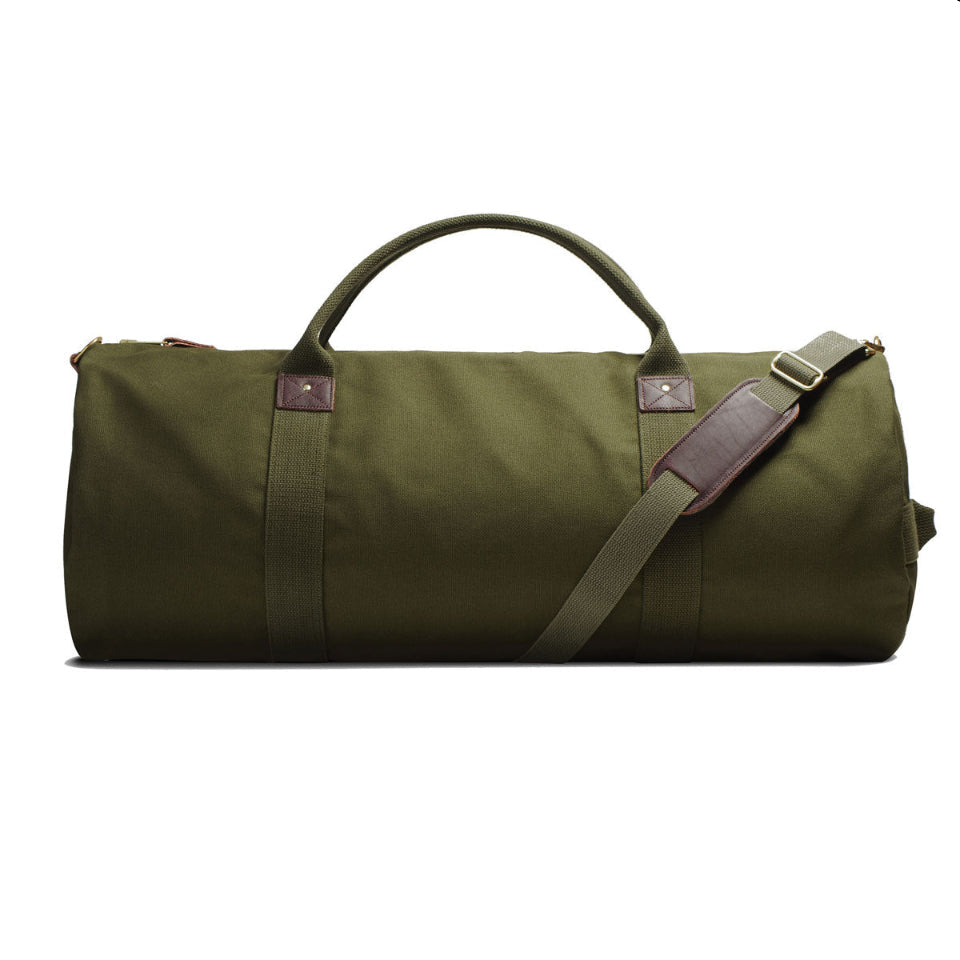 Green duffel bag with a shoulder strap on a white background
