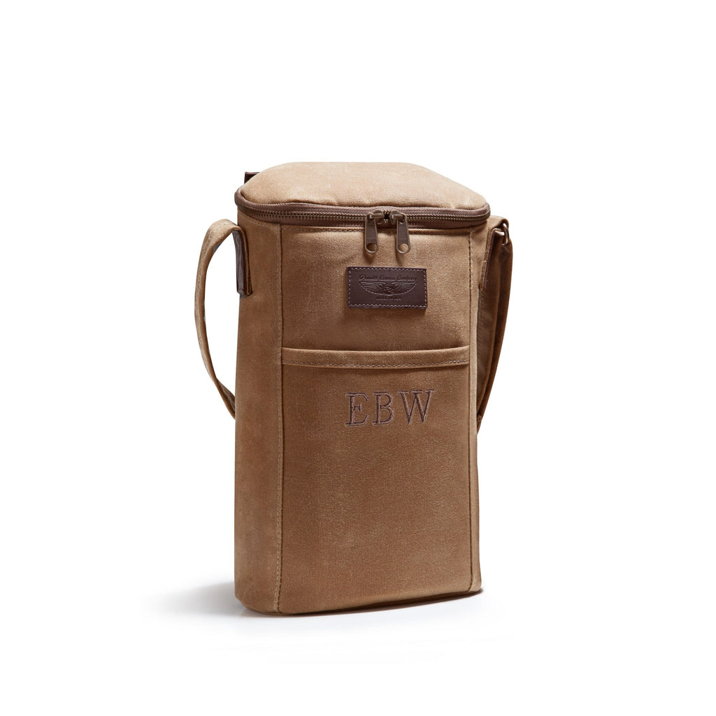 A tan canvas bourbon carrier bag with a top zipper, shoulder strap, and monogrammed 'EBW' on the front pocket, shown on a white background.
