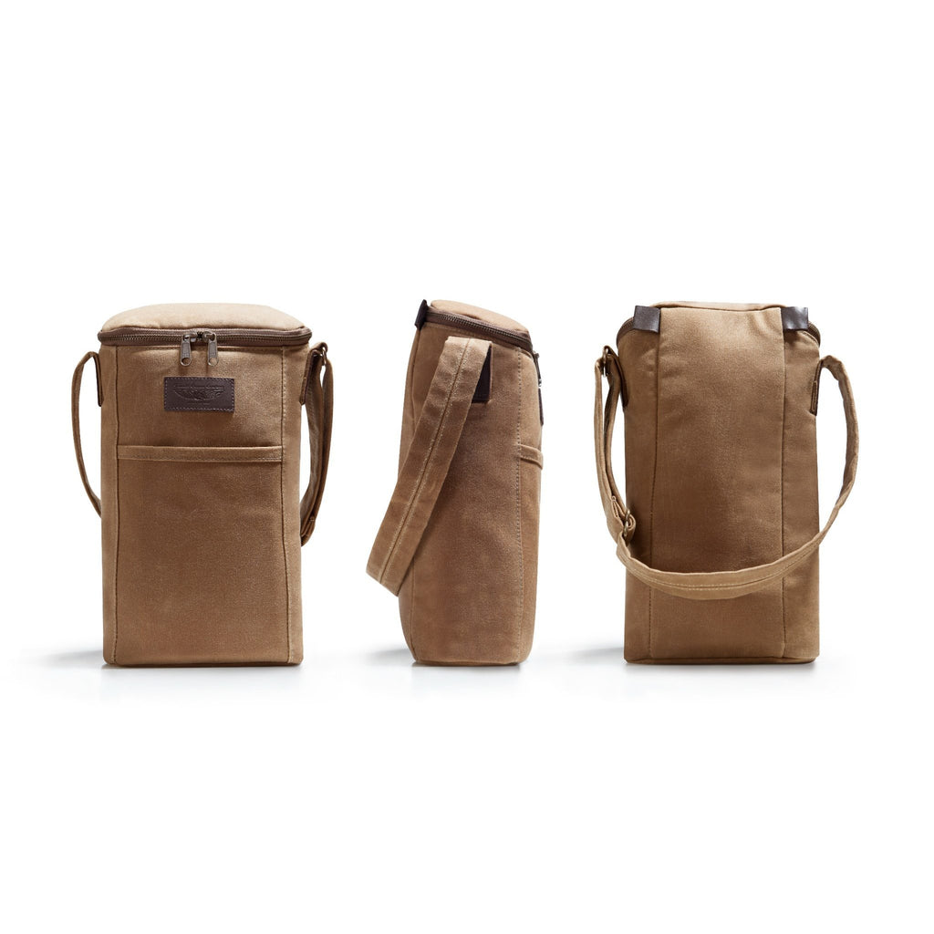 A brown canvas bourbon bag showing front, back and side with a top zipper, front pocket, and a dark brown leather brand patch, shown on a clean white background.